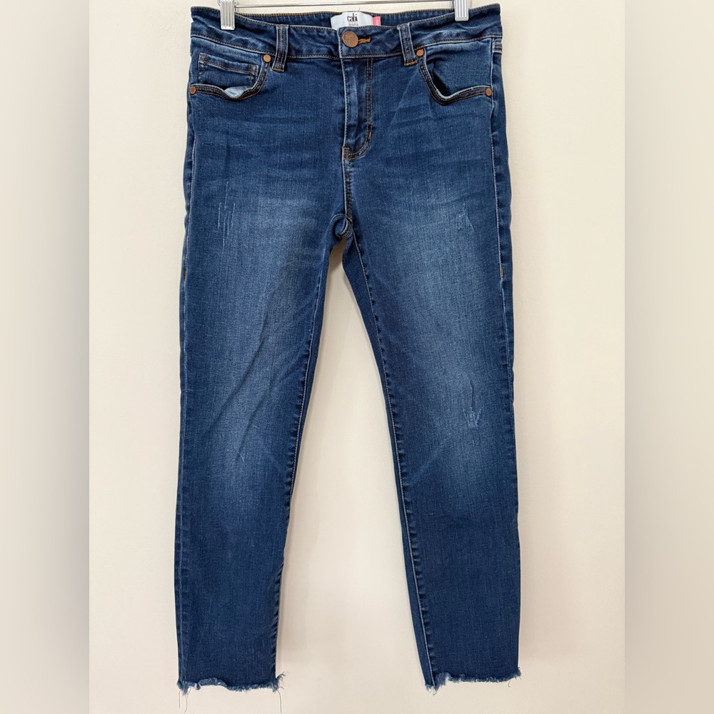 CABI dark wash with light distressing skinny jean in size 8